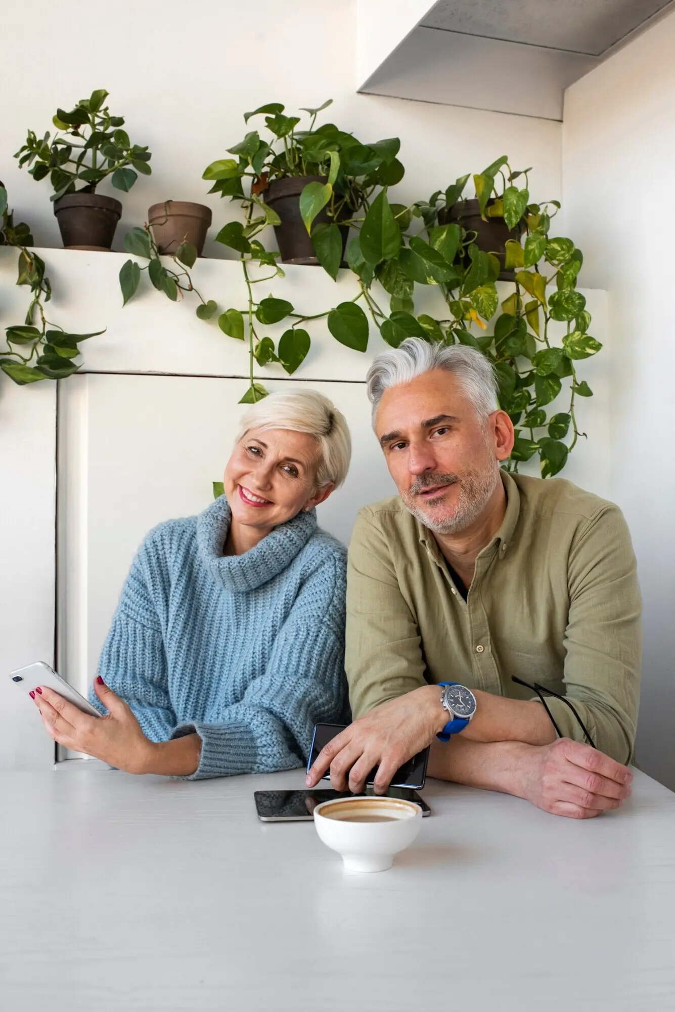 An elderly couple learning to use technology